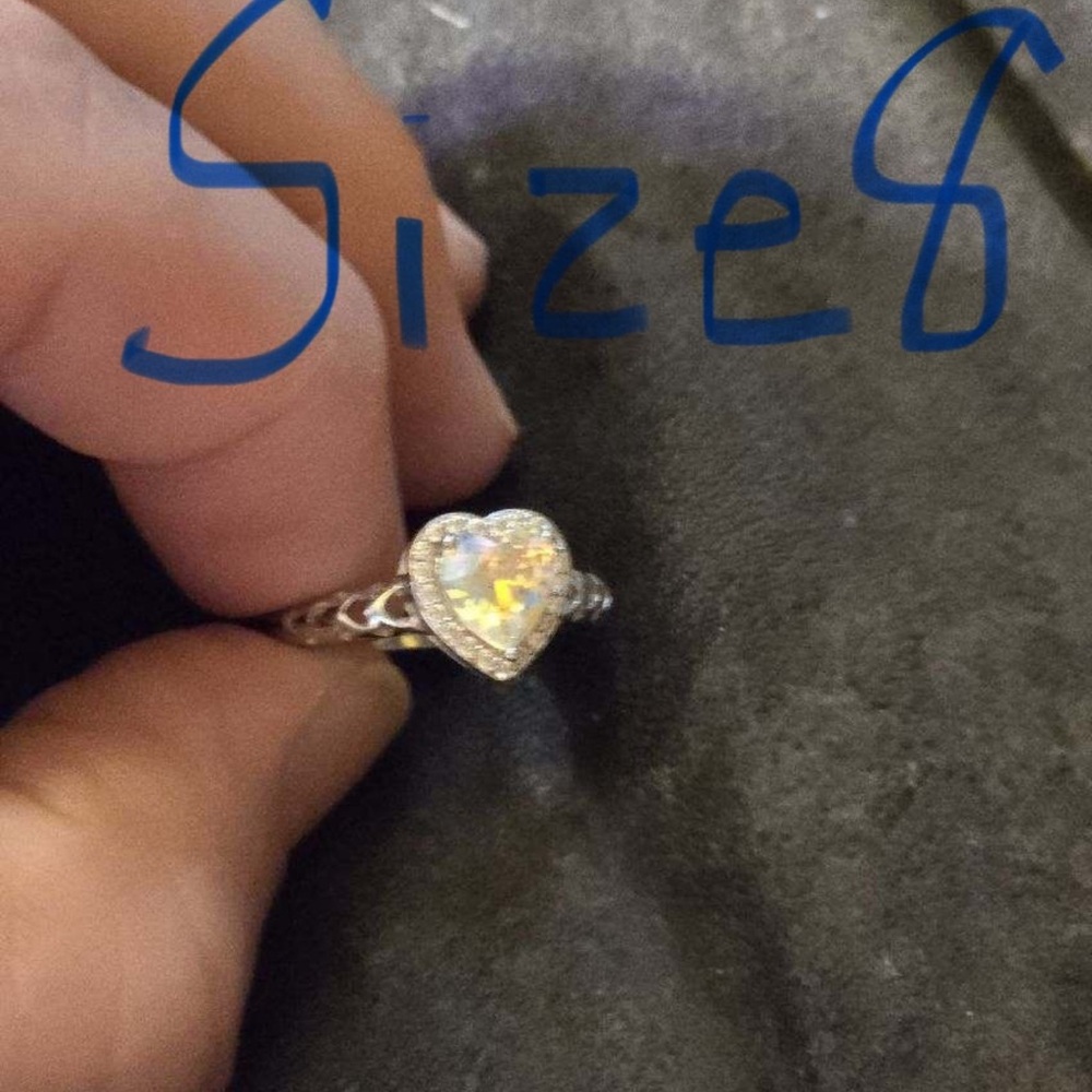 .925 Sterling Silver Size 8 Heart Ring! The stone is an AB Stone